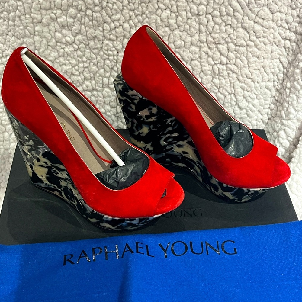 RARE RAPHAEL YOUNG red suede pumps with marbled heels.
